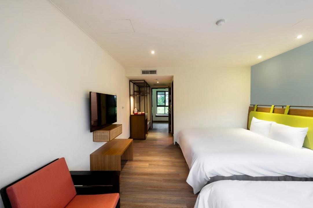 לוגו Howard Resort Xitou מראה חיצוני תמונה